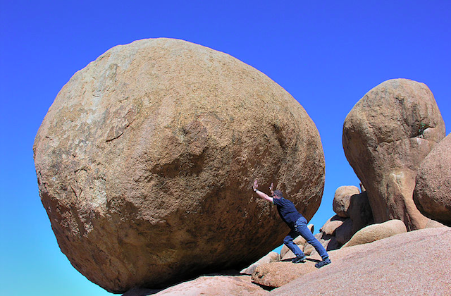Pushing Giant Boulder