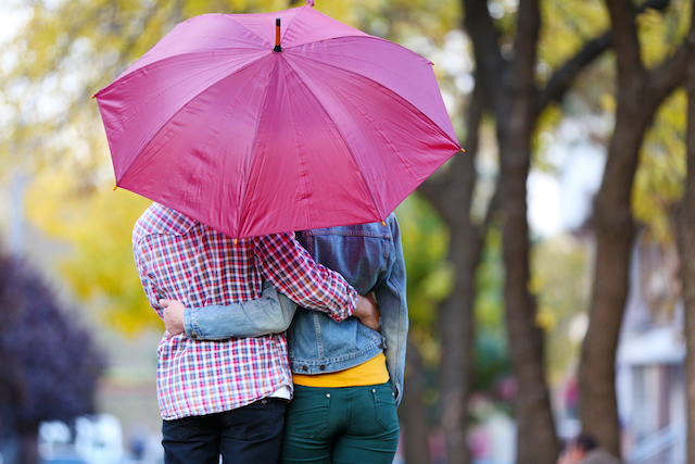 Hugging Under Umbrella