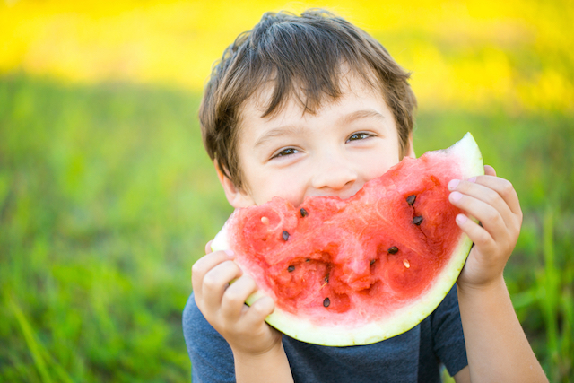 Boy Eating Watermelon